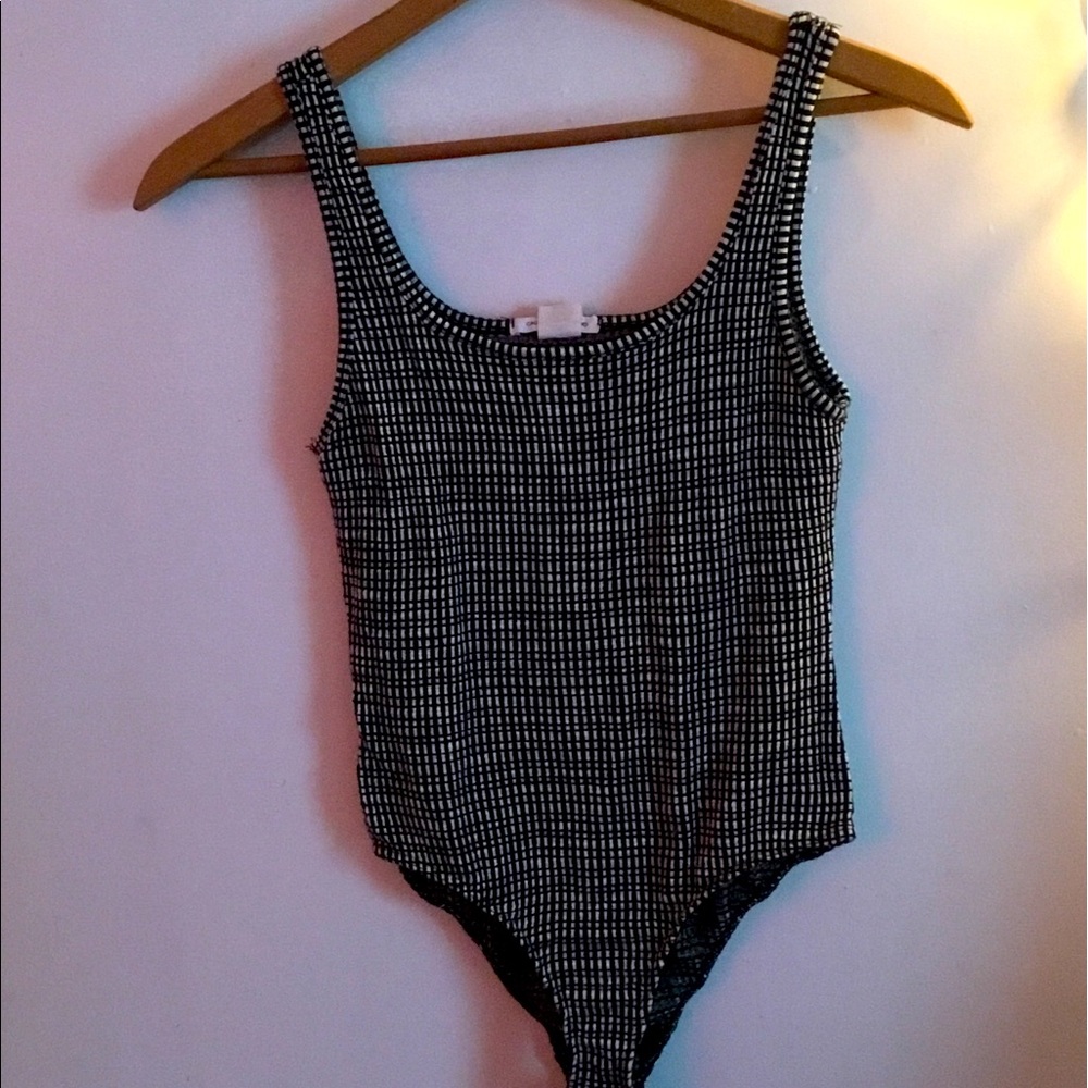 Medium black/white Call To The Wind one piece